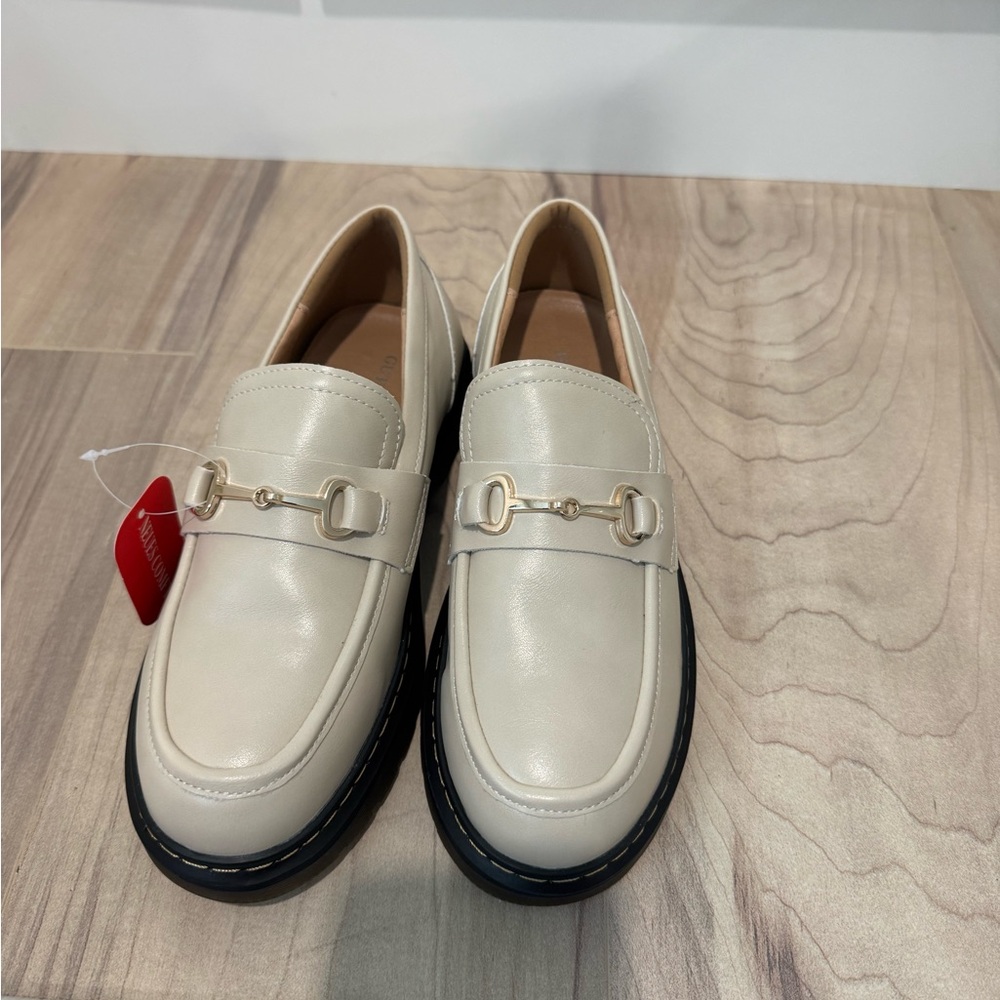 Ivory loafers size 7 NWT